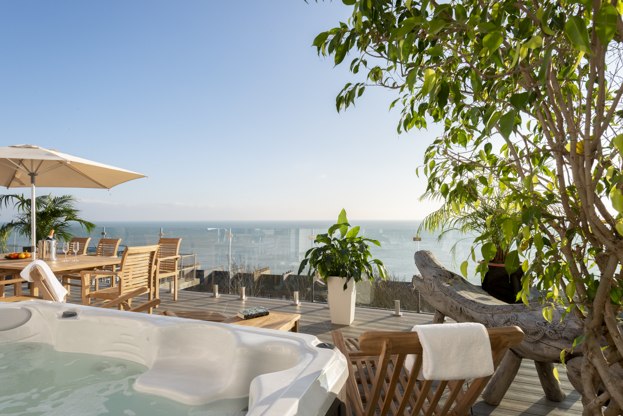 Private hot tub with panoramic sea views