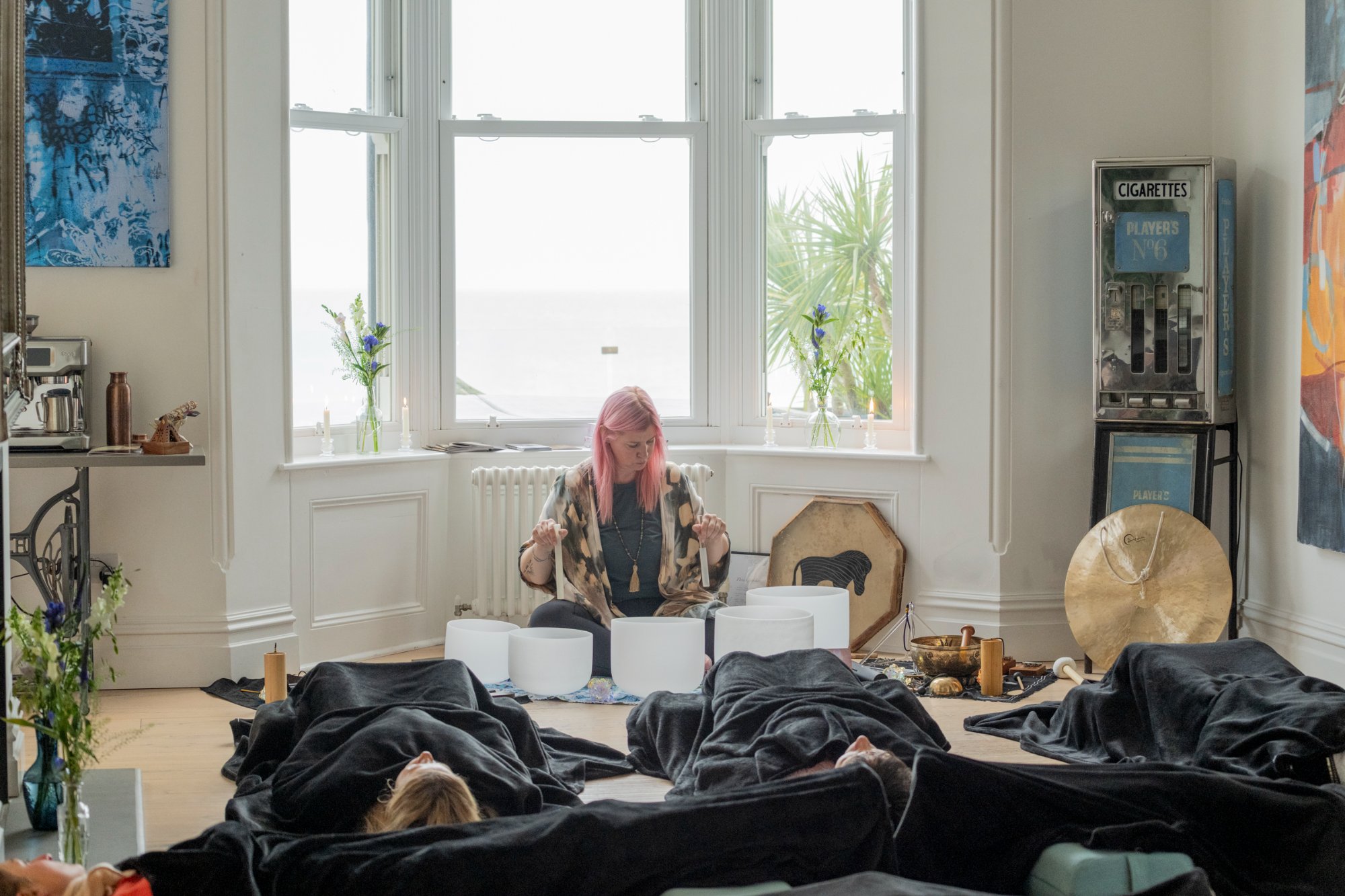 Sound bath session with crystal bowls and sea views