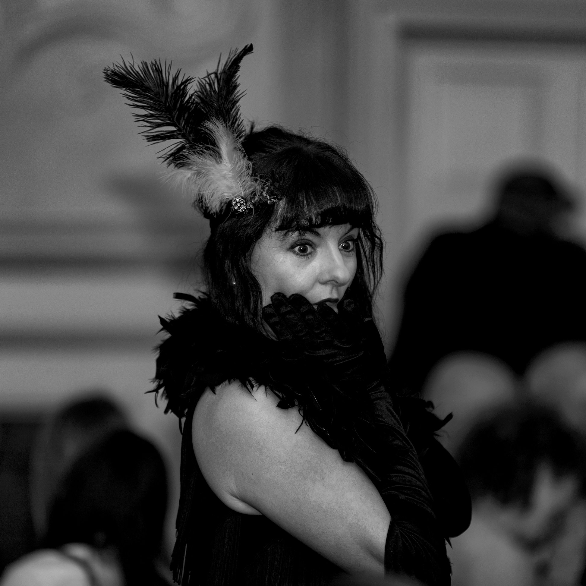 A performer in 1920s costume at a My Event Concierge murder mystery evening